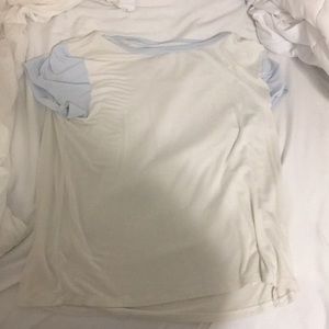 cream top with light blue sleeves